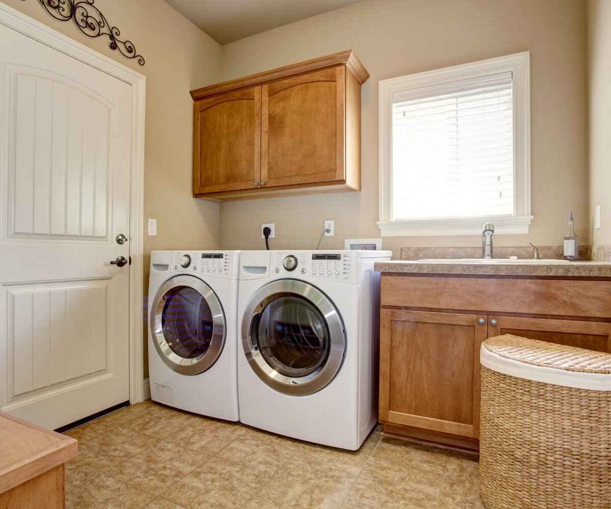 A washer and dryer in a clean laundry room.