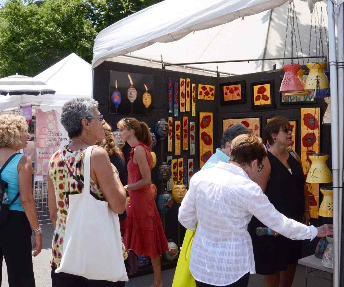 People looking at art at the Ann Arbor Art Fair.