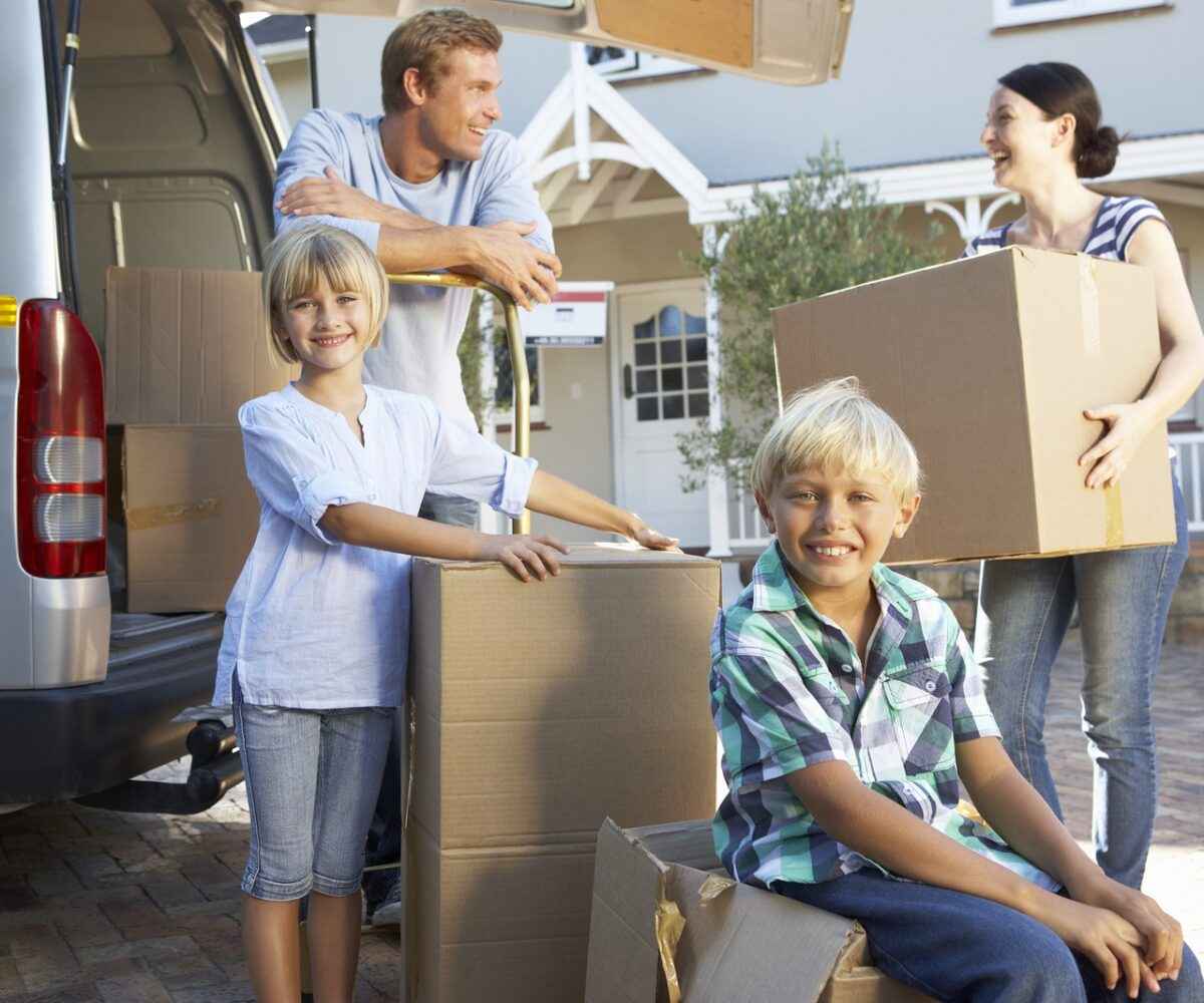 Young family moving out of their house.