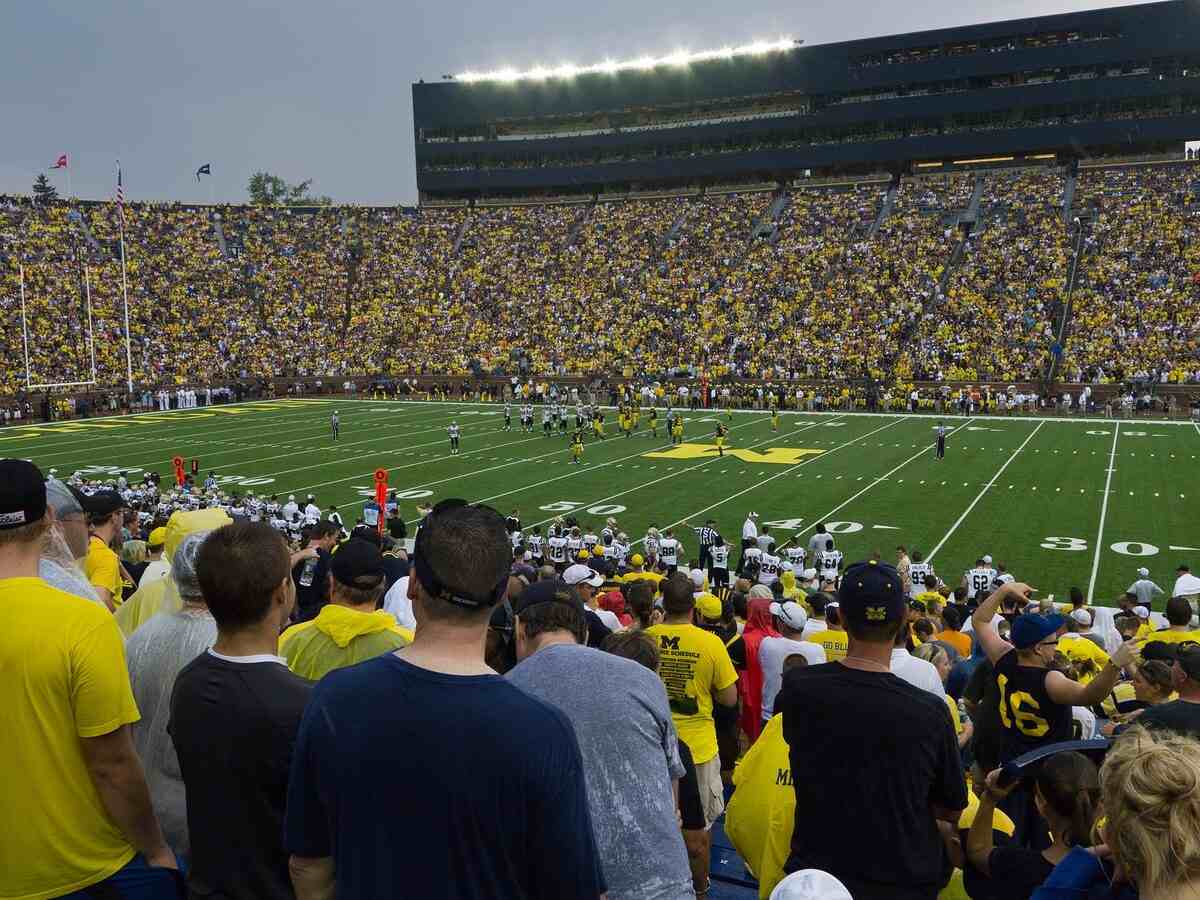 Crowd watching a football game at the University of Michigan.