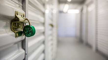 Green lock on a storage unit.