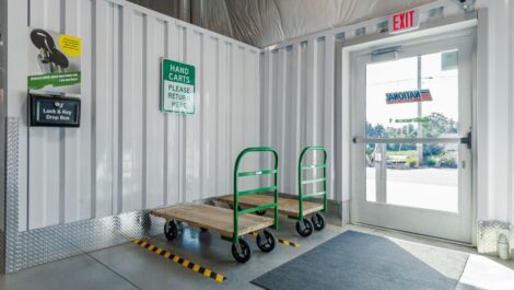 Hand carts by an access door at National Storage in Byron Center, MI.