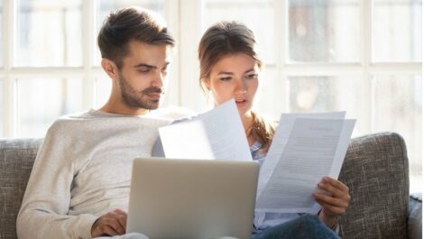 Couple looking at paperwork.